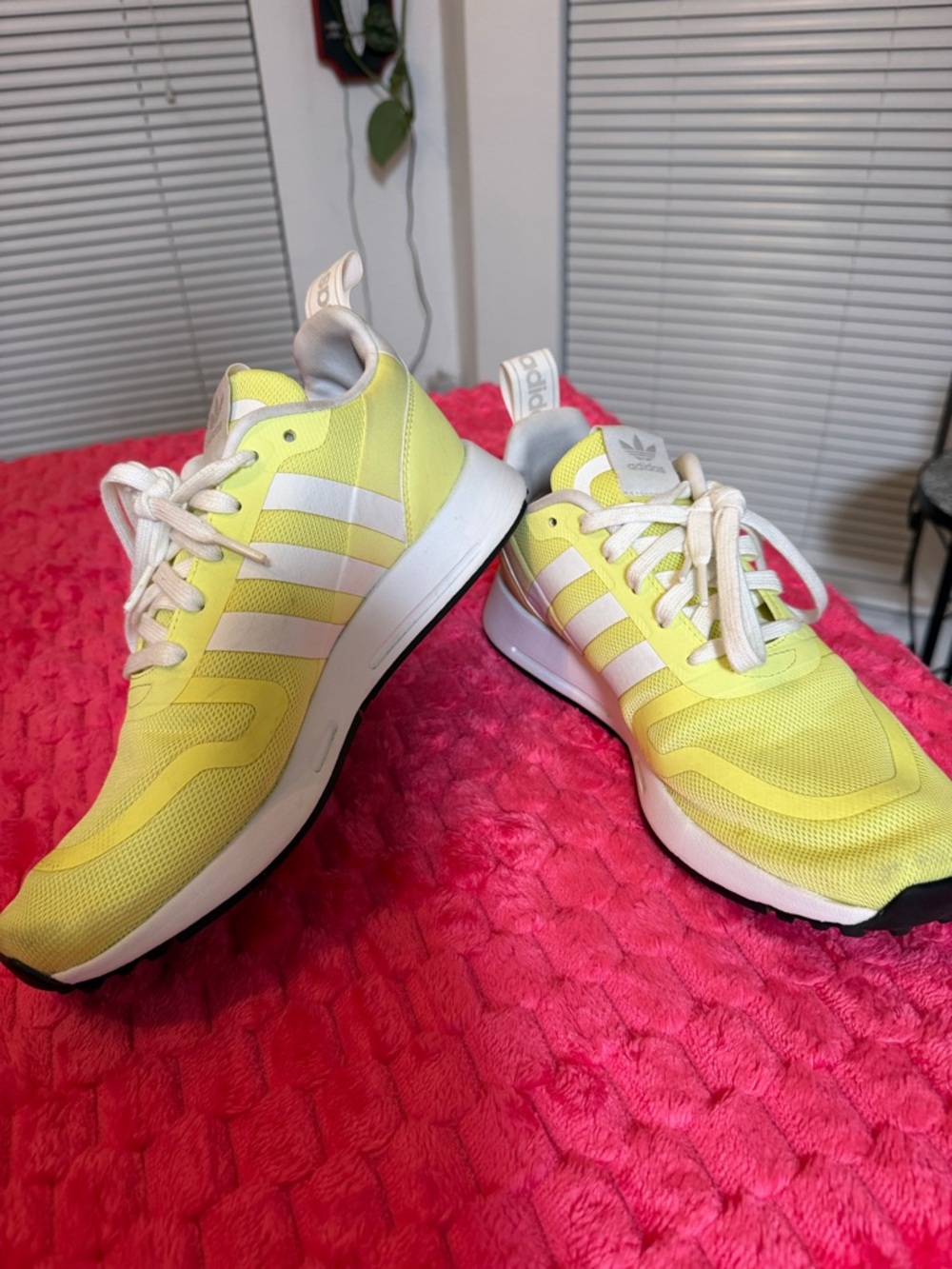 adidas women’s Yellow and White Lace-Up Sneakers